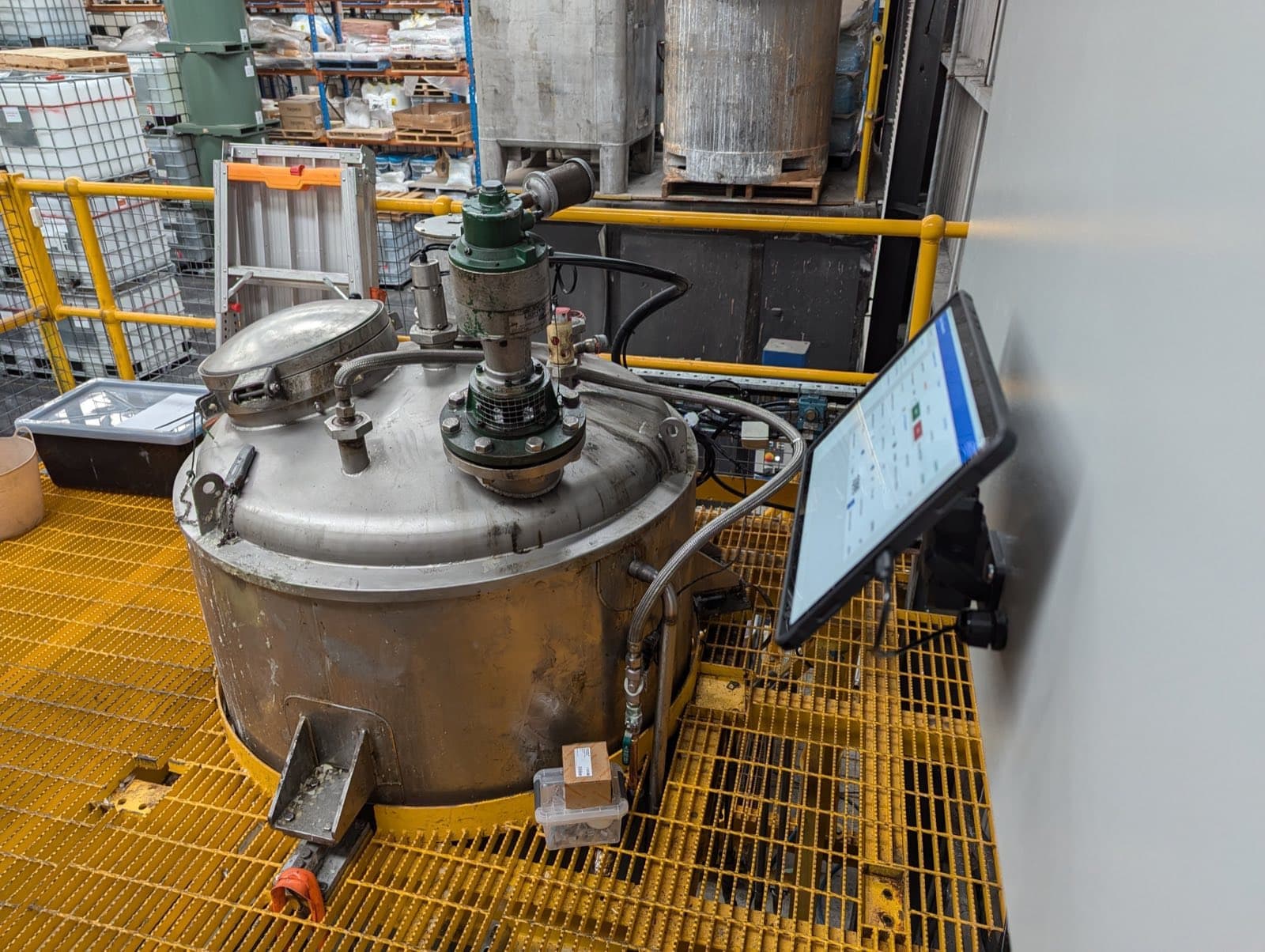Tablet screen mounted beside a process vessel